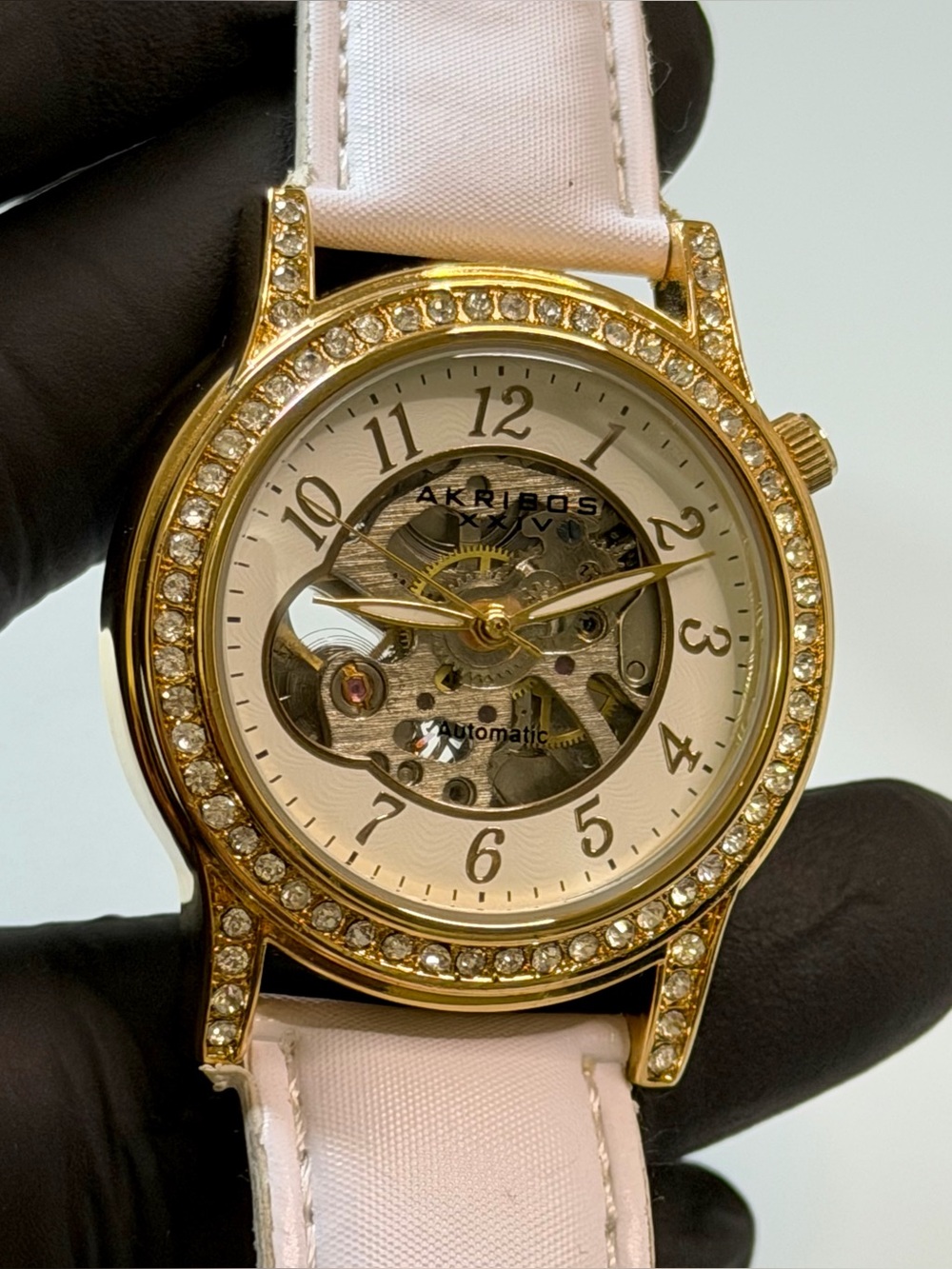 Akribos XXIV Skeleton AK475WT Automatic Gemmed Gold-Tone SS 38mm Unisex Watch